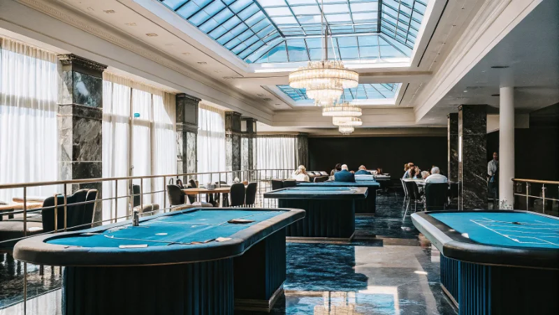 Modern casino restaurant dining area with natural daylight from skylights